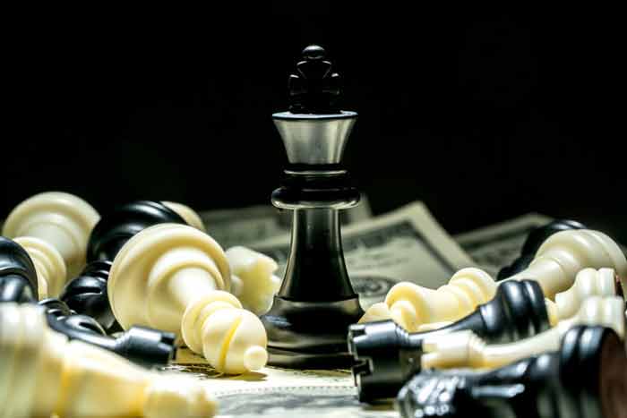Chess pieces and money